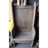 AN EARLY WOODEN CHAIR. 129 cm x 58 cm.