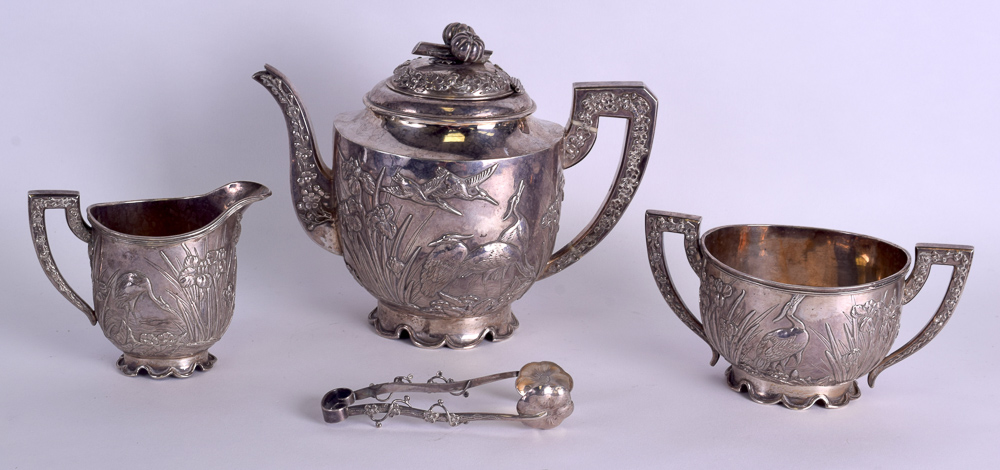 A GOOD 19TH CENTURY CHINESE EXPORT THREE PIECE SILVER TEASET by Wang Hing, with matching sugar