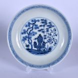 A CHINESE BLUE ANAD WHITE PORCELAIN DISH BEARING XUANDE MARKS, painted with flowering rock and