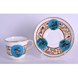 19th c. Minton coffee cup and saucer, each side painted with a bird in a circular turquoise panel, a