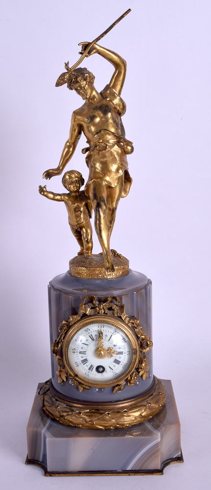 A LOVELY 19TH CENTURY FRENCH GILT BRONZE AND AGATE MANTEL CLOCK modelled as two classical figures