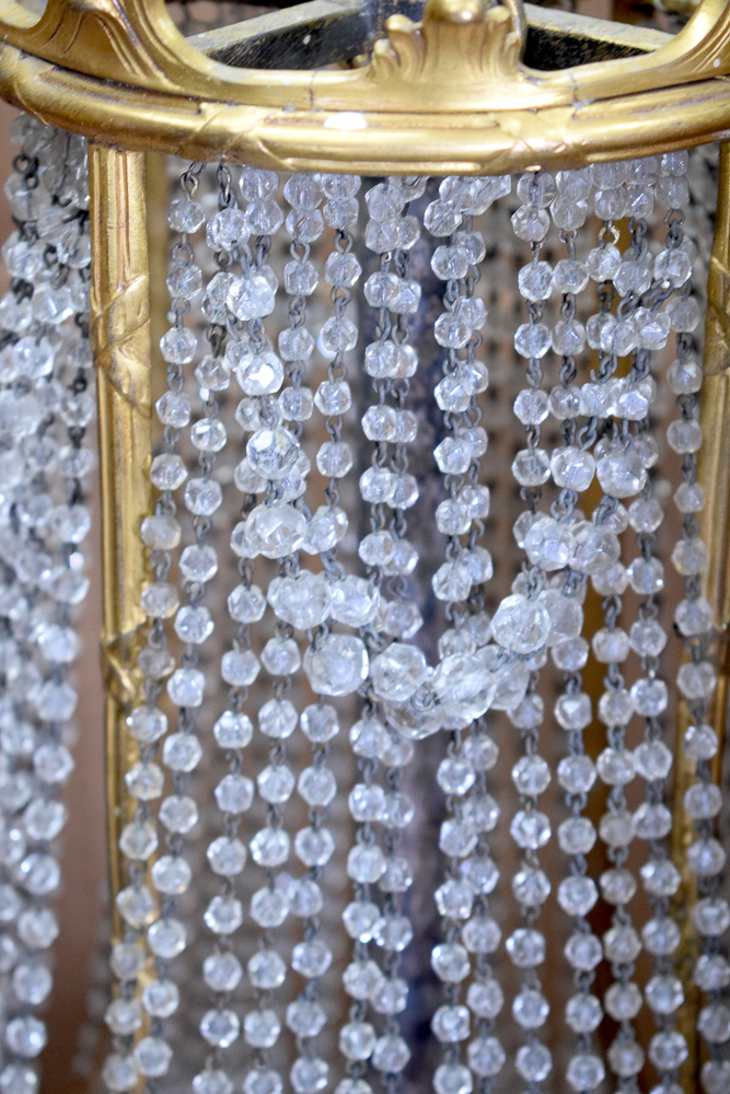 A GOOD ANTIQUE CHANDELIER, formed with spherical facetted glass droplets and ormolu floral swag - Image 6 of 7