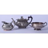 A VICTORIAN SILVER PLATED TEA SET, comprising of tea pot, milk jug and sugar bowl. (3)