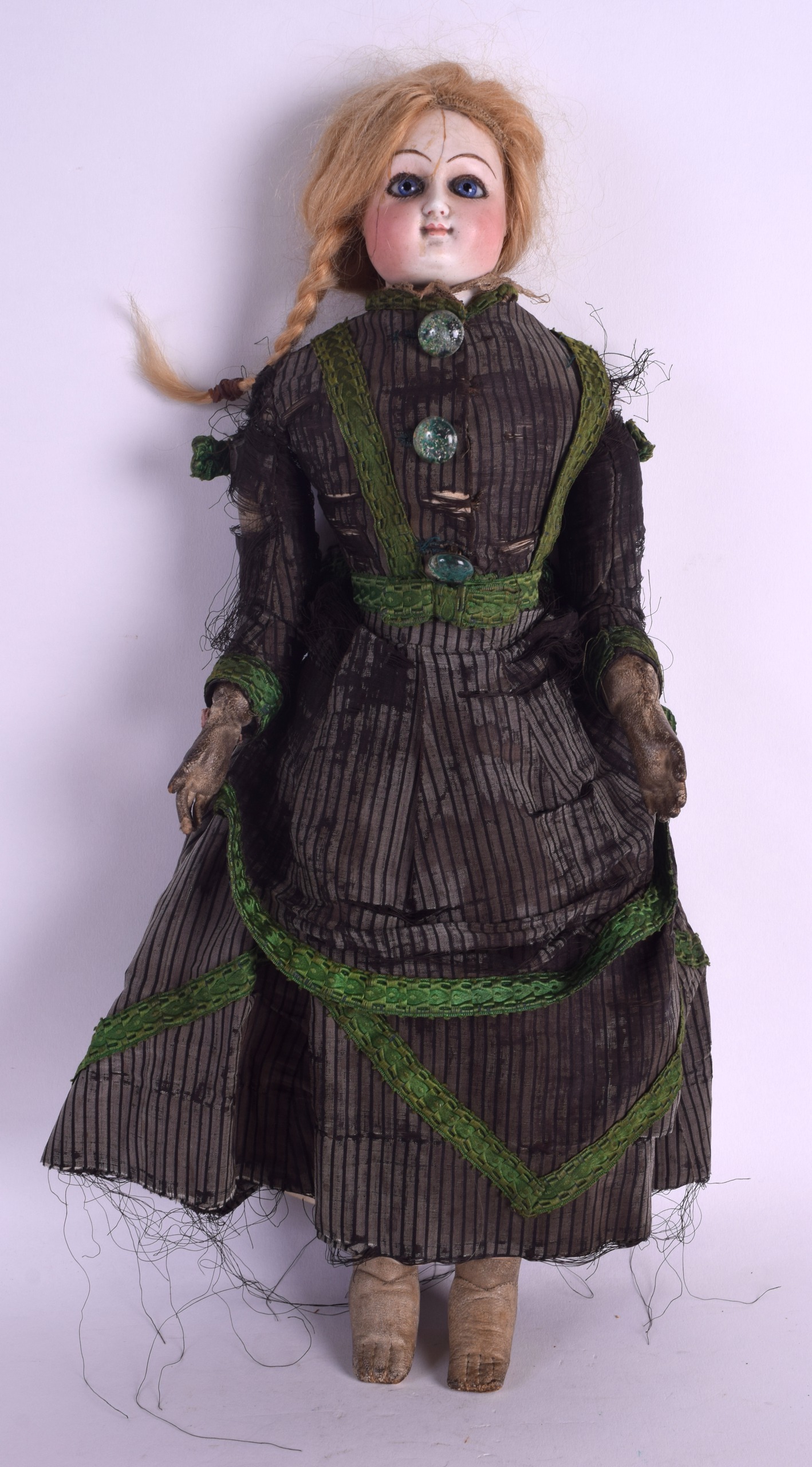 A 19TH CENTURY FRENCH PORCELAIN HEADED DOLL possibly by Bebe Jumeau, modelled in period green and