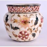 A SMALL HUNGARIAN ZSOLNAY PECS VASE decorated with flowers. 7.5 cm x 7 cm.