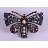 A GOLD SILVER DIAMOND PEARL RUBY AND SAPPHIRE BUTTERFLY BROOCH. 10.1 grams. 3.75 cm x 2.5 cm.