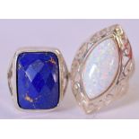 A LAPIS INSET SILVER MOUNTED RING, together with another. (2)