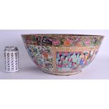 A VERY LARGE MID 19TH CENTURY CHINESE CANTON FAMILLE ROSE PORCELAIN BOWL Qing, painted with figures,