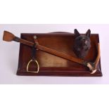 A CHARMING NOVELTY EDWARDIAN BLACK FOREST HUNTING LETTER RACK formed with a fox head and riding