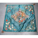 AN EARLY 20TH CENTURY JAPANESE MEIJI PERIOD EMBROIDERED SILK PANEL decorated with opposing birds