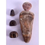 A UNUSUAL EGYPTIAN CARVED AND PAINTED WOODEN AMULET together with three Central Asian seals. (4)