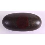 AN UNUSUAL CHINESE CARVED BUDDHIST LINGAM STONE of polished form with large red tones. 15 cm x 6.5
