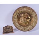 AN EARLY 20TH CENTURY ENGLISH BRASS PLAQUE DEPICTING A SHIP AT FULL SAIL, together with a letter