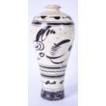 A CHINESE CIZHOU TYPE POTTERY VASE, decorated with stylised foliage. 27 cm.