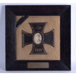 AN EARLY 20TH CENTURY GERMAN MILITARY IRON CROSS PHOTOGRAPH FRAME dated 1914. 40 cm square.