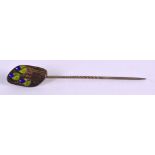 AN ART NOUVEAU GLASGOW SCHOOL ENAMELLED STICK PIN. 6.75 cm long.