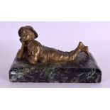 AN EARLY 20TH CENTURY FRENCH BRONZE AND MARBLE PAPERWEIGHT modelled as a reclining boy. 13 cm x 8