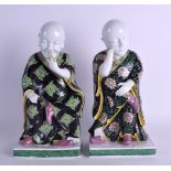A LARGE PAIR OF 19TH CENTURY CHINESE FAMILLE VERTE FIGURES OF IMMORTALS Kangxi style, painted with