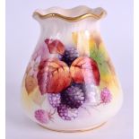 A ROYAL WORCESTER PIE CRUST VASE C1950 painted with fruit and berries. 9 cm high.