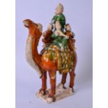 A LARGE CHINESE SANCAI GLAZED POTTERY STATUE OF A CAMEL, possibly Tang, formed with multiple