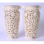 A PAIR OF CHINESE BLANCE DE CHINE DOUBLE WALL RETICULATED PORCELAIN VASES, the body forming