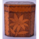 AN EARLY 20TH CENTURY POLKAWORK TEA CADDY, octagonal in shape and carved with foliage. 13 cm high.