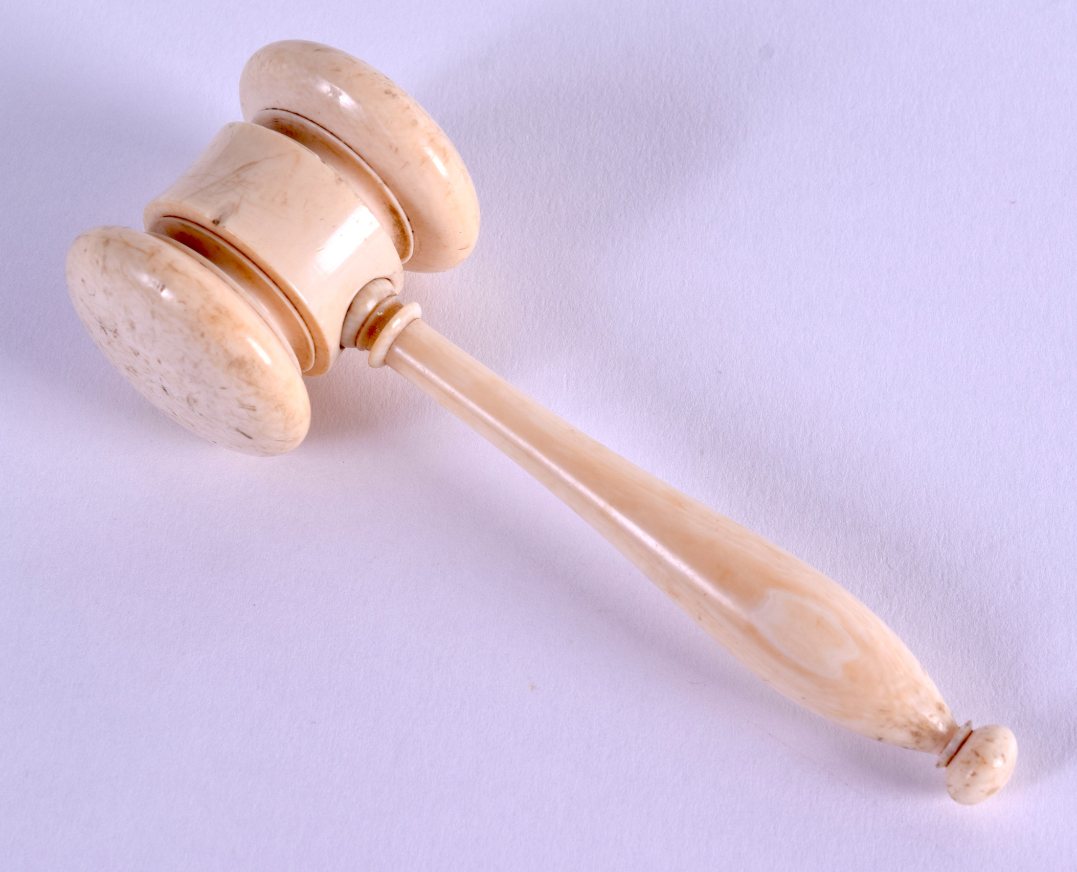 A MID 19TH CENTURY EUROPEAN CARVED IVORY GAVEL. 12 cm x 4 cm.