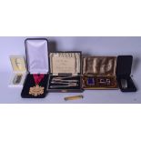 A BOXED VINTAGE CUFFLINK SET WITH LIGHTER, together with a pair of nutcrackers etc. (qty)