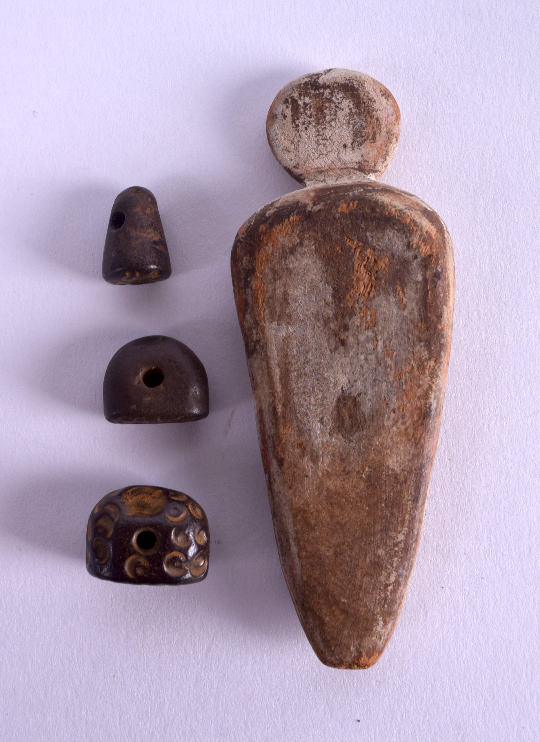 A UNUSUAL EGYPTIAN CARVED AND PAINTED WOODEN AMULET together with three Central Asian seals. (4) - Image 2 of 3