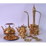 A COLLECTION OF BRASSWARE, including a large etched water pot, tea pot, vases etc. (qty)