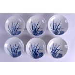 A SET OF SIX 19TH CENTURY JAPANESE BLUE AND WHITE DISHES painted with flowers and vines. 12 cm
