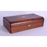 A LATE VICTORIAN/EDWARDIAN SILVER INLAID OAK GAMING BOX the top rising to reveal boxes & gaming