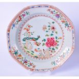AN 18TH CENTURY FAMILLE ROSE CHINESE PORCELAIN DISH, painted with exotic birds by flowering rock.