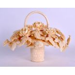 AN UNUSUAL EARLY 20TH CENTURY CHINESE CANTON CARVED IVORY BASKET C1910 of naturalistic form,