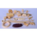 A QUANTITY OF IVORY ANIMALS, mostly elephants, together with assorted articles. (qty)