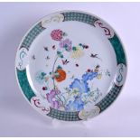 AN EARLY 20TH CENTURY CHINESE FAMILLE ROSE PORCELAIN DISH Guangxu, painted with birds flying over