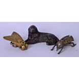 A MODERN BRONZE SCULPTURE OF A RECUMBANT HOUND, together with a brass inkwell in the form of a fly