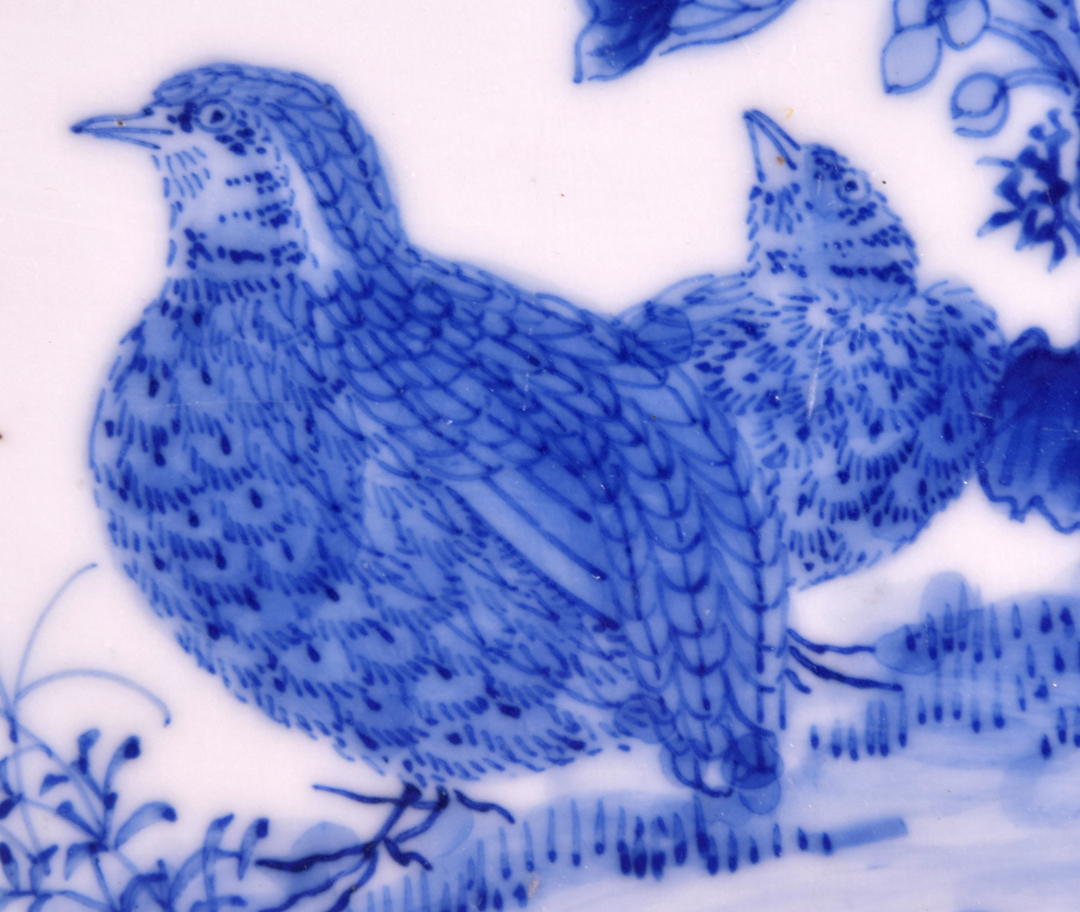 A SET OF THREE 19TH CENTURY JAPANESE BLUE AND WHITE TILES painted with game birds within landscapes. - Image 2 of 4