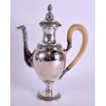 A STYLISH MID 19TH CENTURY SILVER PLATED ARGYLE COFFEE POT AND COVER with ivorine handle. 26 cm