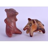 TWO INDUS VALLEY FIGURES one formed as a seated bear, the other a recumbent animal. 12 cm high & 5