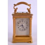 A 19TH CENTURY FRENCH BRASS REPEATING CARRIAGE CLOCK the silvered dial encased within Corinthian
