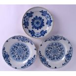 THREE 18TH CENTURY DELFT PLATES probably English. Largest 23 cm wide. (3)