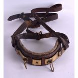 A RARE 18TH/19TH CENTURY BRASS AND LEATHER HORSE COLLAR SUPPORT with body supports.