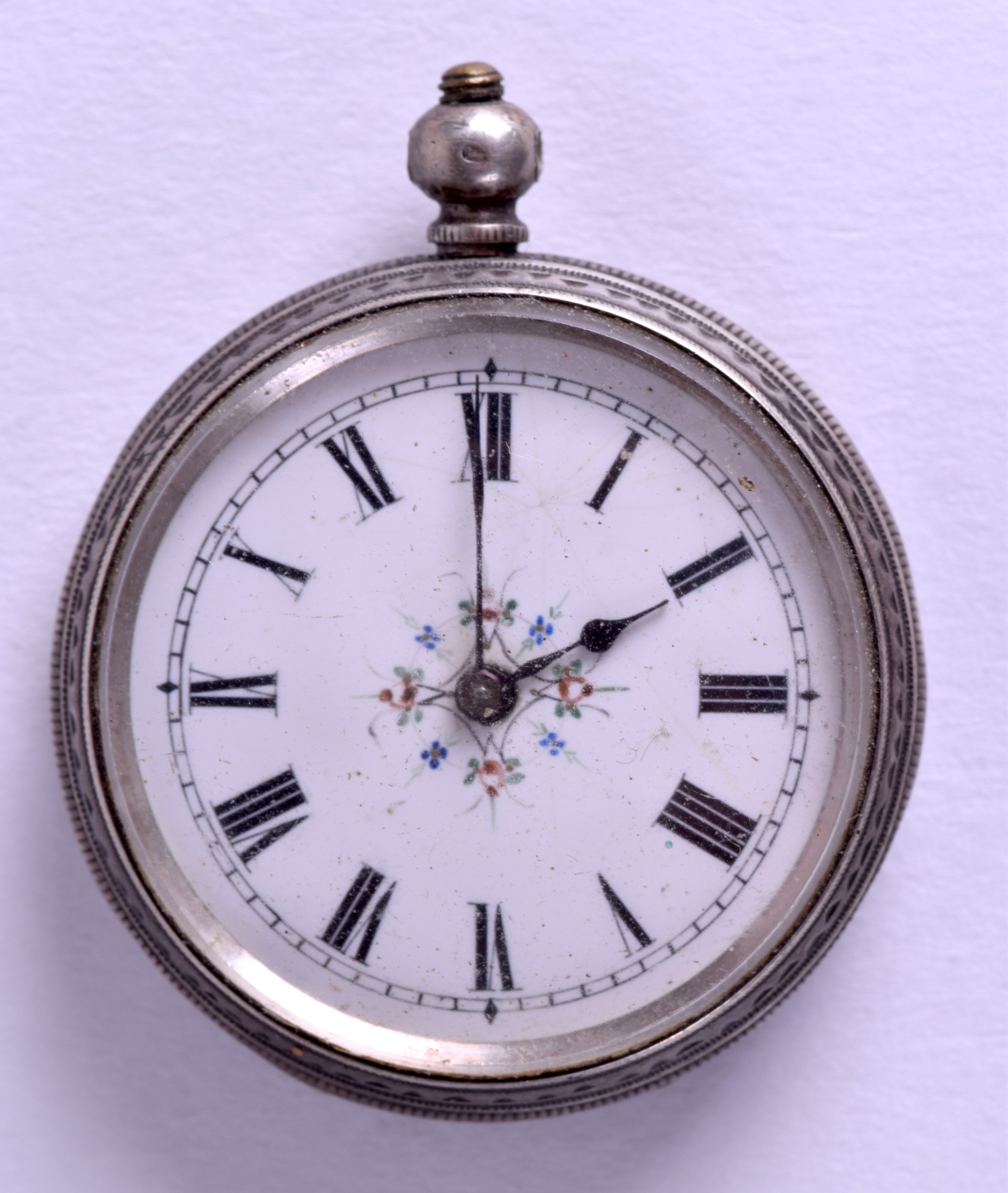 AN ANTIQUE CONTINENTAL SILVER FOB WATCH. 3.5 cm diameter.