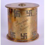 A WWI MILITARY BRASS SHELL CASE AMMO BOX AND COVER engraved with various motifs. 8.75 cm high.