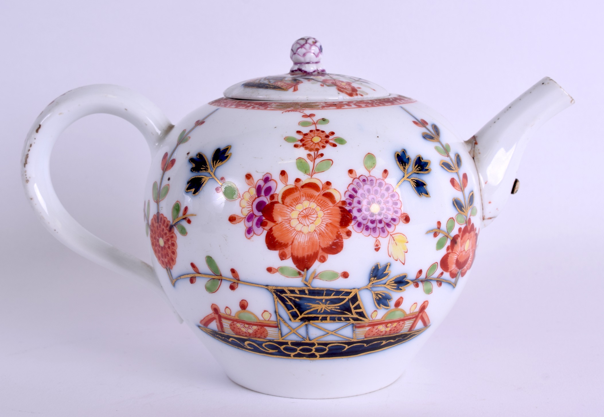 AN 18TH CENTURY MEISSEN PORCELAIN TEAPOT AND COVER painted with trees and foliage. 18 cm wide. - Image 2 of 4