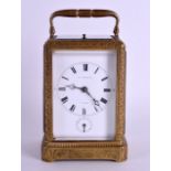 A MID 19TH CENTURY FRENCH REPEATING BRASS CARRIAGE CLOCK by F L Hausburg A Paris, with foliate