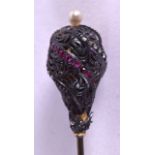 A MID 19TH CENTURY FRENCH PEARL SILVER AND DIAMOND GARNET PIN. 22 cm long.