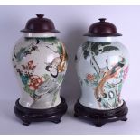 A LARGE PAIR OF CHINESE REPUBLICAN PERIOD PORCELAIN JARS AND COVERS painted with birds and
