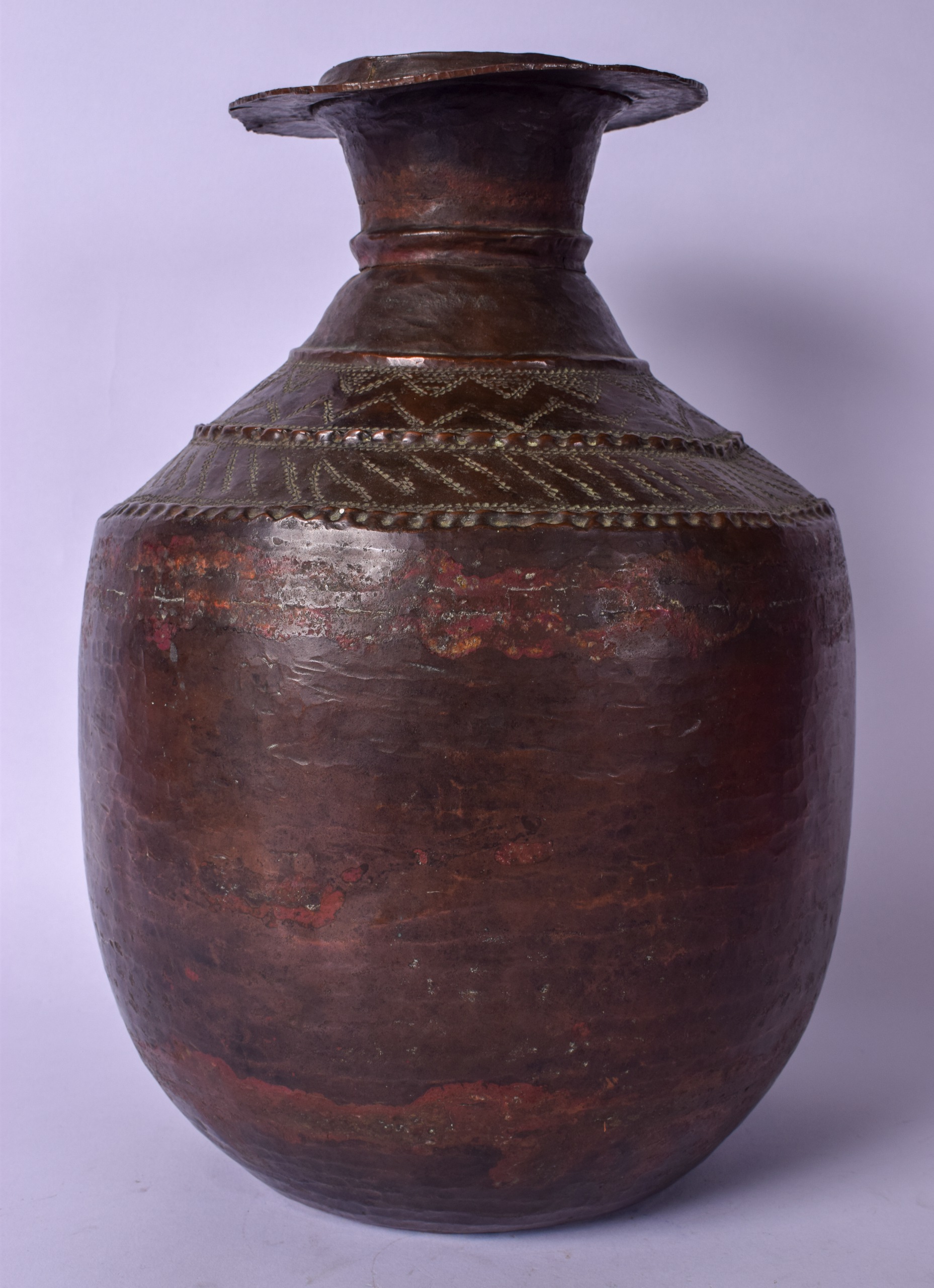 A LARGE 19TH CENTURY EASTERN COPPER VESSEL, with engraved banding to body. 34 cm high.